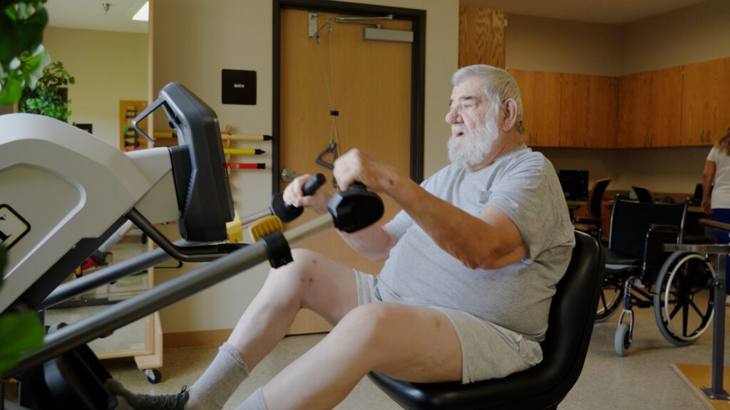 A man uses therapy equipment at a short term care center